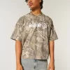 Φαρδύ βαρέων βαρών Crop Dodge Graphic Camo Tee Φαρδύ βαρέων βαρών Crop Dodge Graphic Camo Tee