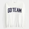 Γραφικό πουλόβερ Hollister Comfy Cloud Oversized Go Team Γραφικό πουλόβερ Hollister Comfy Cloud Oversized Go Team
