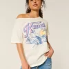 Υπερμεγέθη γραφικό μπλουζάκι Kauai Off-the-Shoulder Υπερμεγέθη γραφικό μπλουζάκι Kauai Off-the-Shoulder