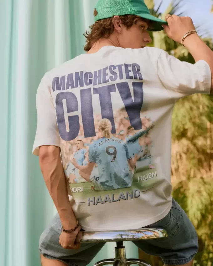 Manchester City F.C. Γραφικό μπλουζάκι Manchester City F.C. Γραφικό μπλουζάκι