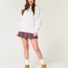 Ψηλόμεσο Mini Skort με πλισέ Ψηλόμεσο Mini Skort με πλισέ