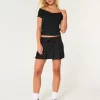 Ψηλόμεσο Mini Skort με πλισέ Ψηλόμεσο Mini Skort με πλισέ