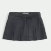 Ψηλόμεσο Mini Skort με πλισέ Ψηλόμεσο Mini Skort με πλισέ
