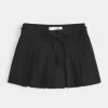 Ψηλόμεσο Mini Skort με πλισέ Ψηλόμεσο Mini Skort με πλισέ
