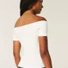 Χαριτωμένο γραφικό μπλουζάκι off-the-Shoulder Χαριτωμένο γραφικό μπλουζάκι off-the-Shoulder
