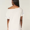 Υπερμεγέθη γραφικό μπλουζάκι Off-the-Shoulder Υπερμεγέθη γραφικό μπλουζάκι Off-the-Shoulder