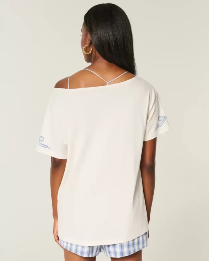 Υπερμεγέθη γραφικό μπλουζάκι Off-the-Shoulder Υπερμεγέθη γραφικό μπλουζάκι Off-the-Shoulder