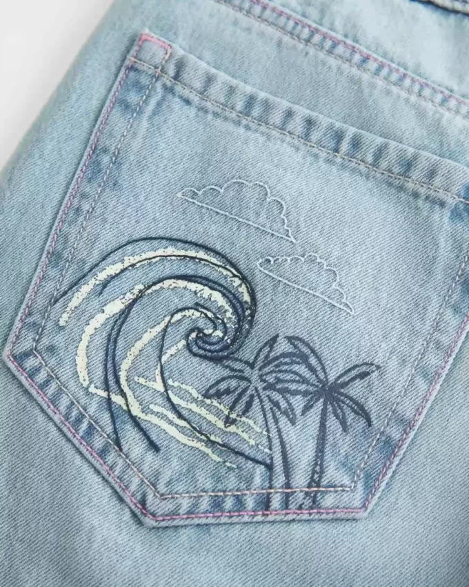 Χαμηλό ύψος Ripped Light Wash Graphic baggy τζιν