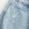 Χαμηλό ύψος Ripped Light Wash Graphic baggy τζιν