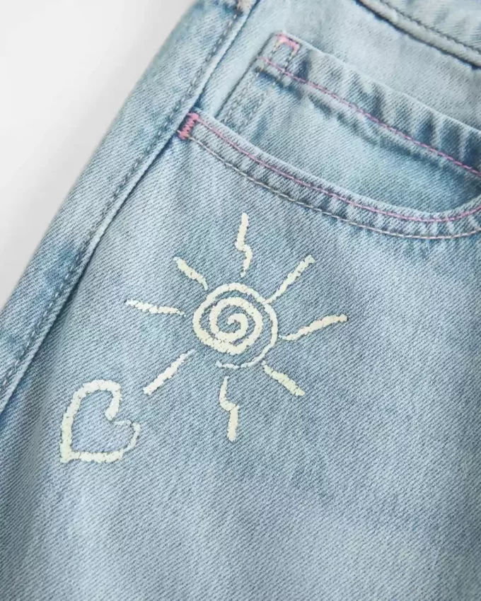 Χαμηλό ύψος Ripped Light Wash Graphic baggy τζιν