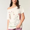 Υπερμεγέθη γραφικό μπλουζάκι Snoopy Off-the-Shoulder Υπερμεγέθη γραφικό μπλουζάκι Snoopy Off-the-Shoulder