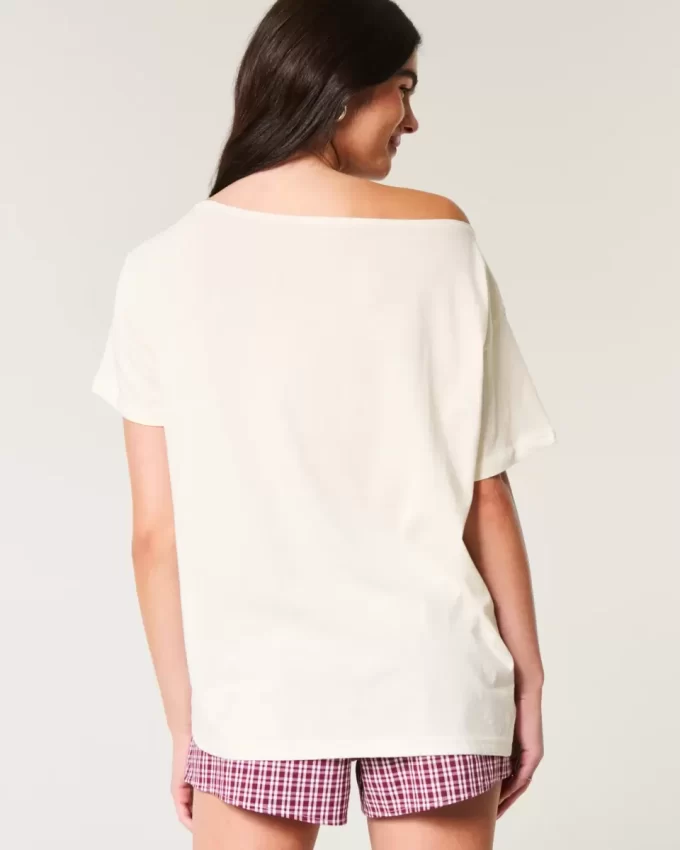Υπερμεγέθη γραφικό μπλουζάκι Snoopy Off-the-Shoulder Υπερμεγέθη γραφικό μπλουζάκι Snoopy Off-the-Shoulder